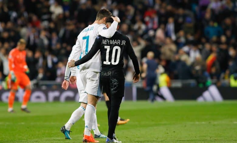 MADRID, SPAIN - FEBRUARY 14: Cristiano Ronaldo of Real Madrid hugs Neymar of Paris Saint-Germain after the UEFA Champions League Round of 16 First Leg match between Real Madrid and Paris Saint-Germain at Bernabeu on February 14, 2018 in Madrid, Spain.